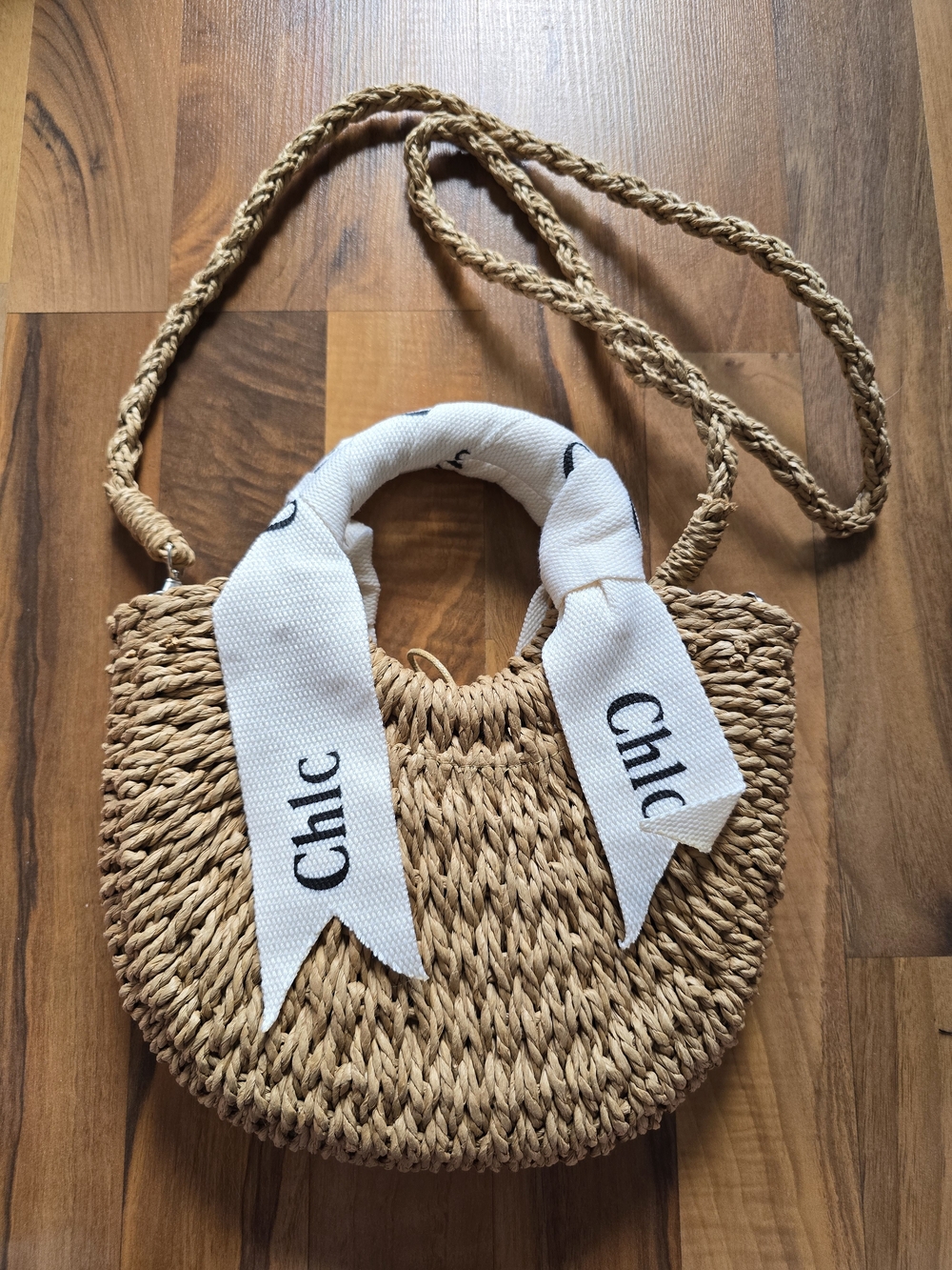 Chic Straw Half-Moon Crossbody Bag in Natural